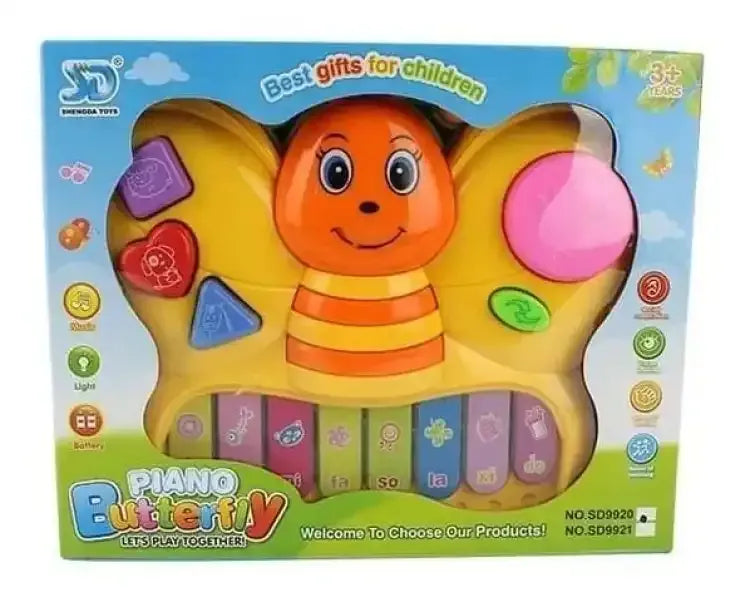 Colorful toy butterfly piano packaging with cartoon face on a blue sky background