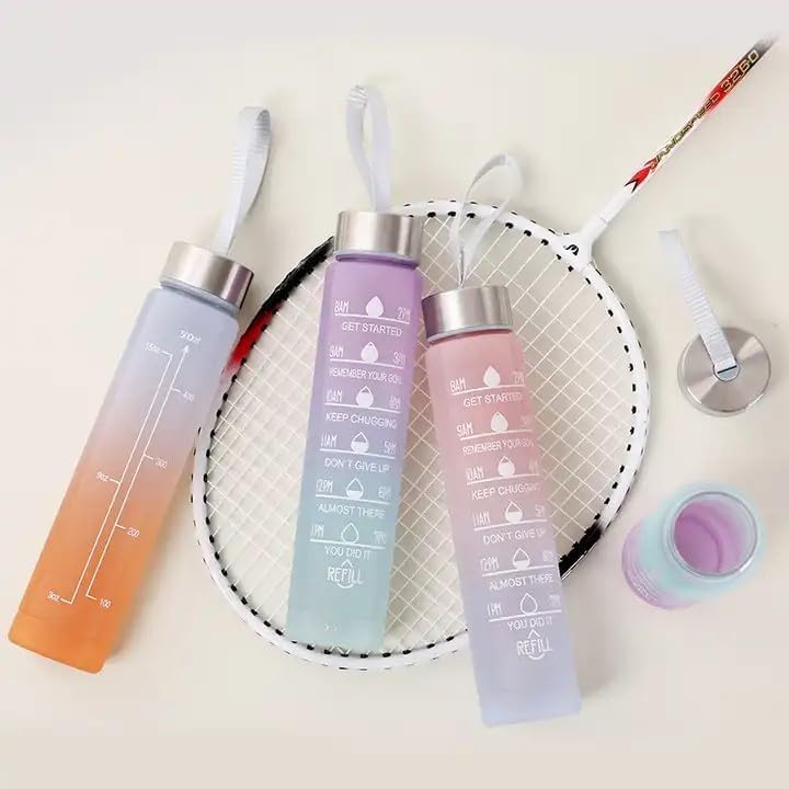 Three gradient water bottles on a badminton racket with a white background