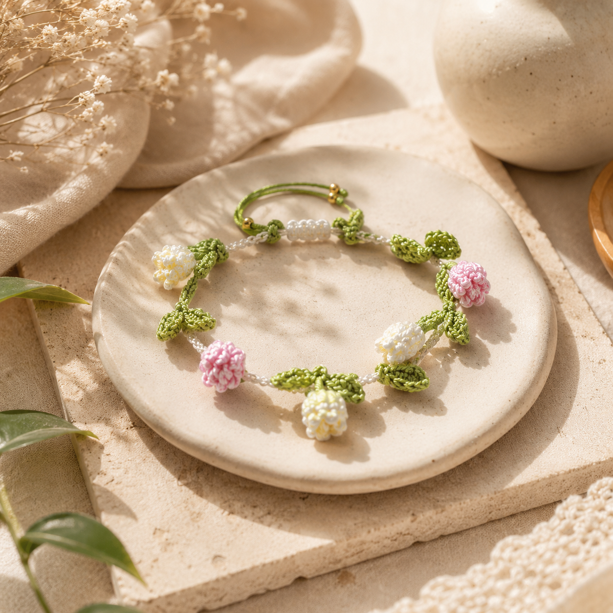 Personalized handmade crochet tulip bracelet featuring pink and ivory tulip flowers with green leaves, customized and made on order for women and girls.