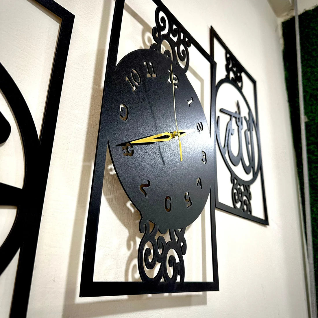 Decorative wall clock with Arabic calligraphy on a white wall