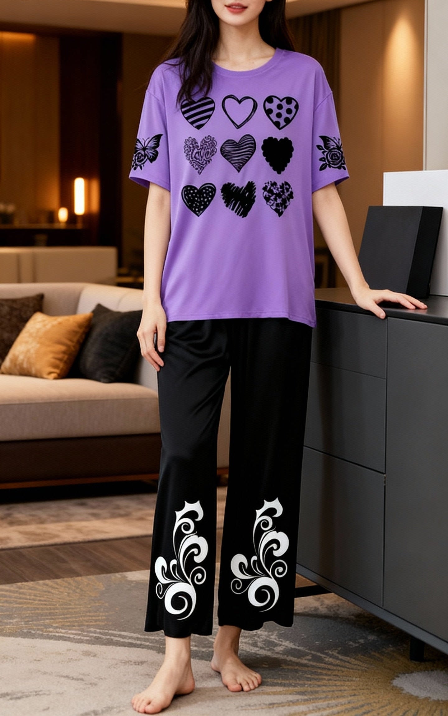 Purple Night suit wearing girl standing in living room