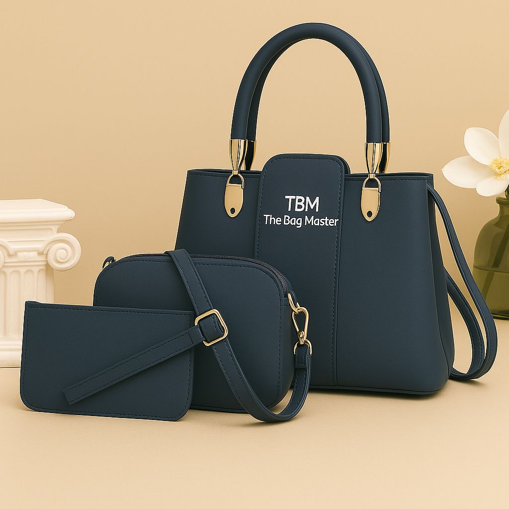 Navy handbag with matching pouch on a beige background, featuring 'TBM The Bag Master' branding.