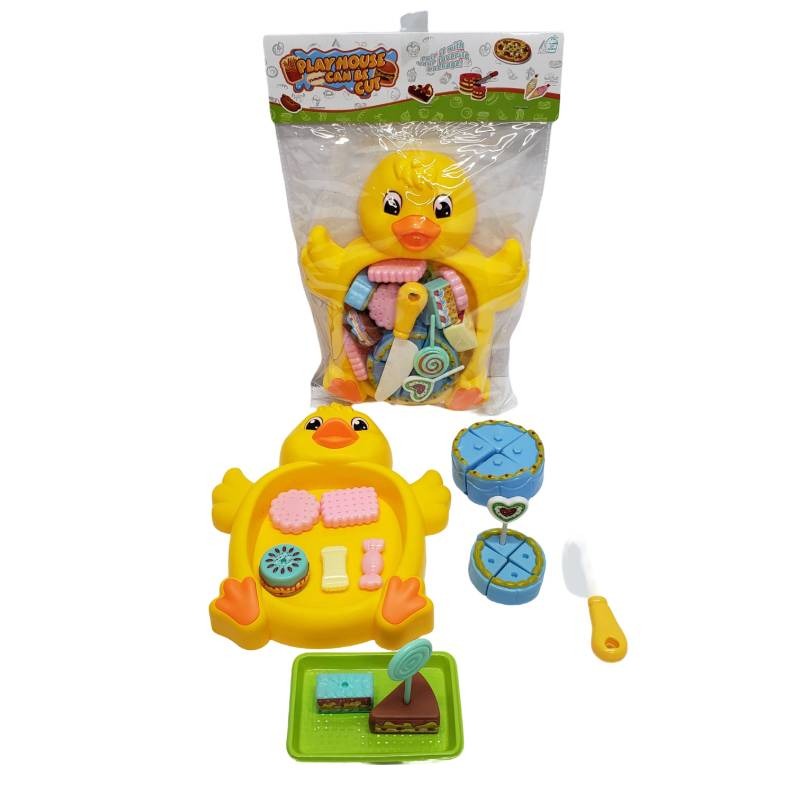 Yellow duck toy with accessories and packaging on a white background