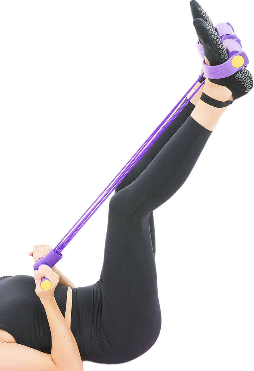 Person exercising with a purple resistance band on a white background