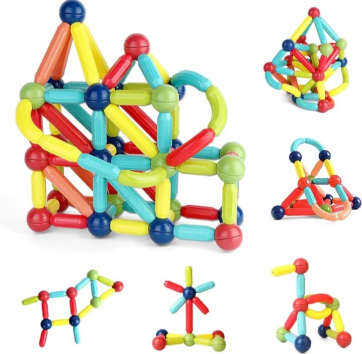 Colorful magnetic building blocks set on a white background