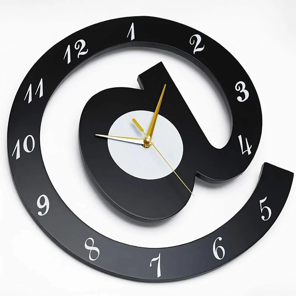 Black wall clock with a unique design on a white background