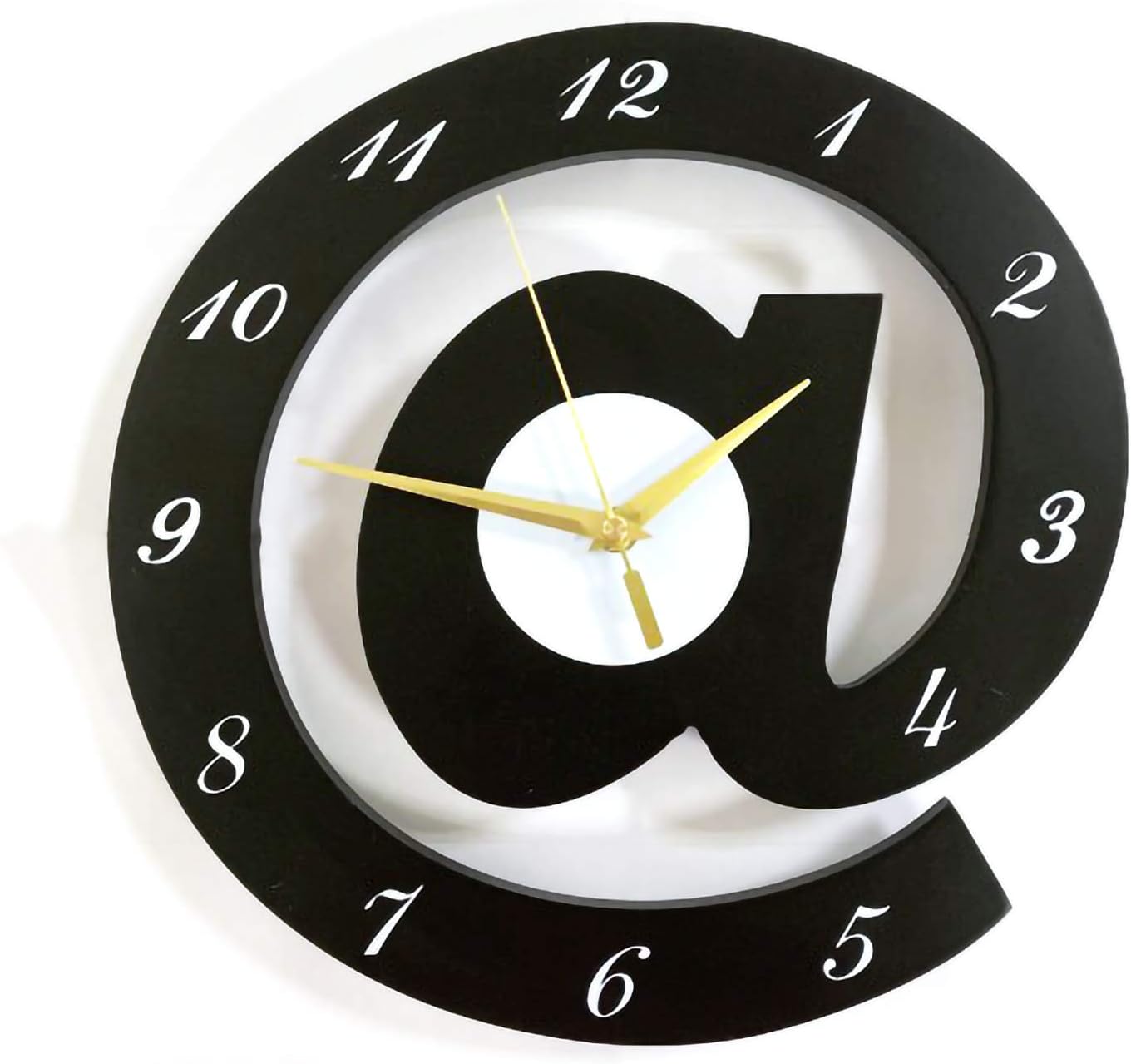 Black wall clock with a unique design on a white background