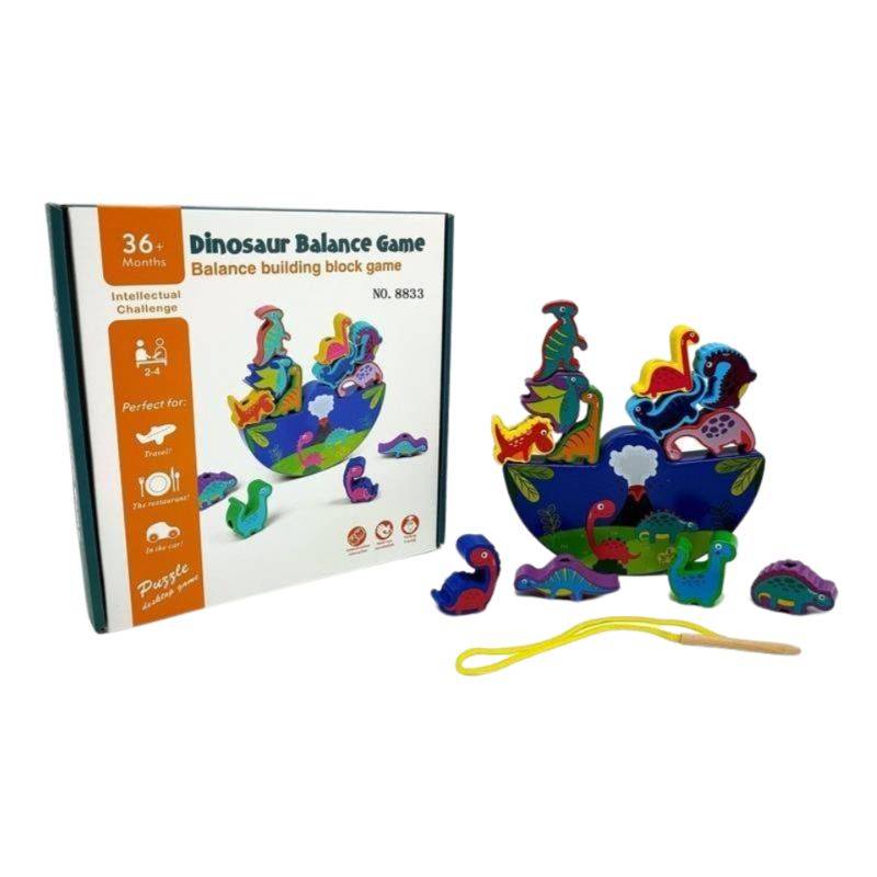 Dinosaur balance game with colorful dinosaur figures and packaging on a white background