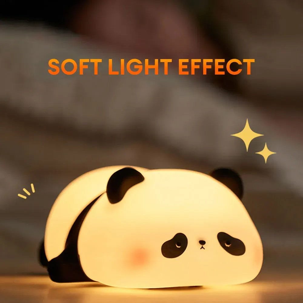 Panda-shaped night light with a soft light effect on a dark background