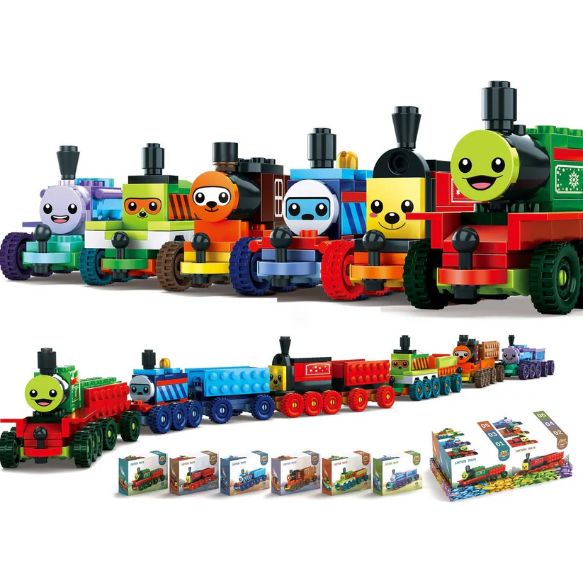 Colorful toy train set with smiling faces and packaging on a white background