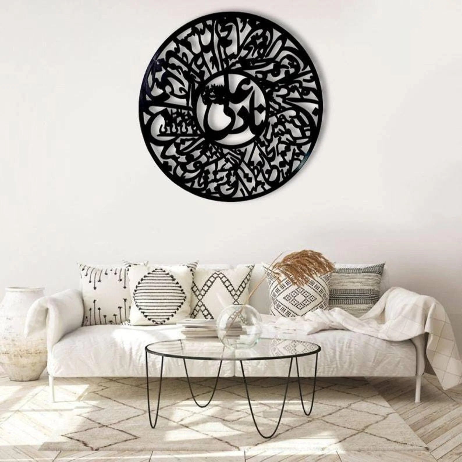 Decorative wall art with Arabic calligraphy in a living room setting.
